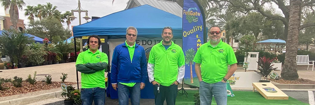 The FertiGator Lawn Care management team at a promotion event near Lady Lake, FL.