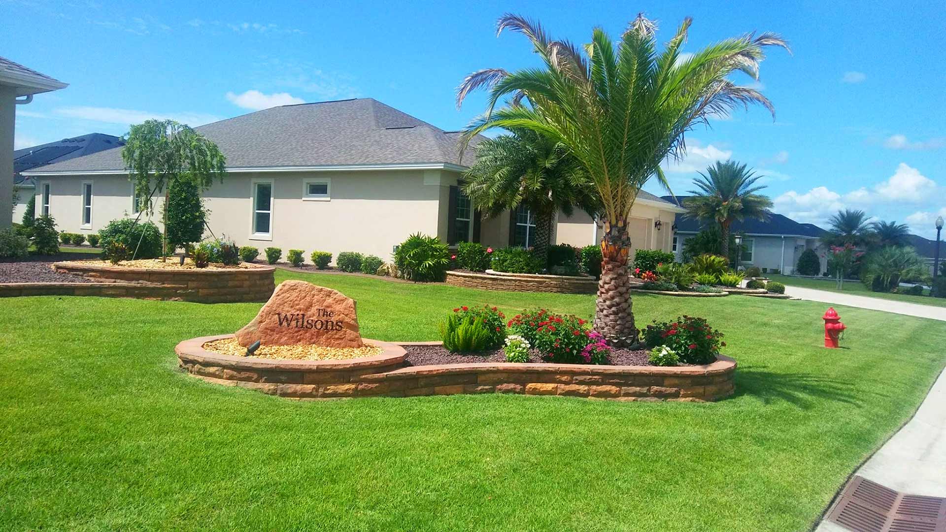 A beautifully curated lawn, cared for and maintained by FertiGator Lawn Care in The Villages, FL area.
