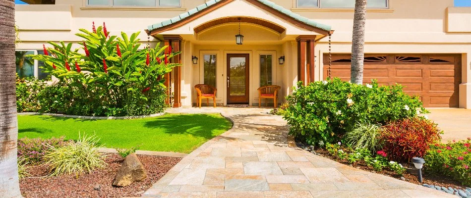 Lush vibrant plants in a front yard of a house in The Villages, FL.