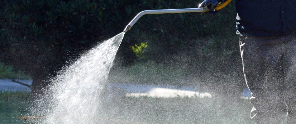 Treating a lawn in The Villages, FL, with fertilizer.