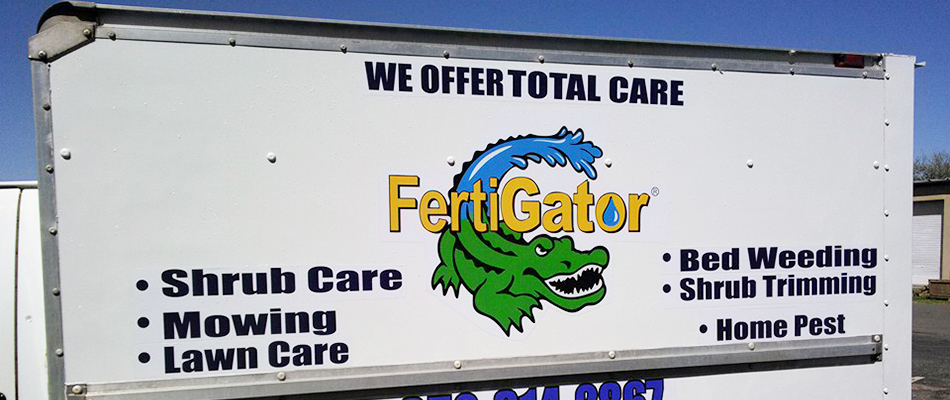 A FertiGator Lawn Care company truck at a customer's property near The Villages, FL.