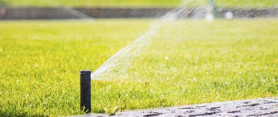 Irrigation system spraying water on a lawn in The Villages, FL.
